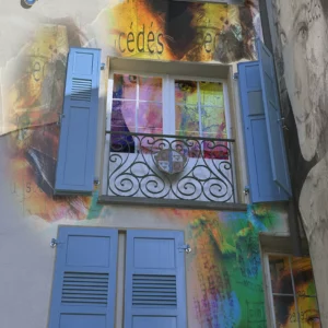 Façades aux volets bleu</br>Gaggiographie avec une</br>Oeuvre d' A. Clavien
